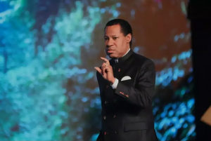 Pastor Chris on the stage explains the meaning of 'CODE RABAH'